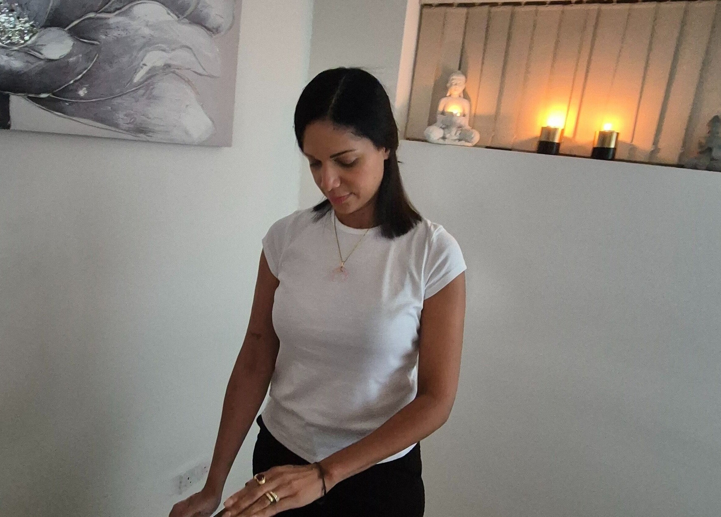 Vibeinwards therapist in peaceful setting with candles in Ruislip, England, GB.