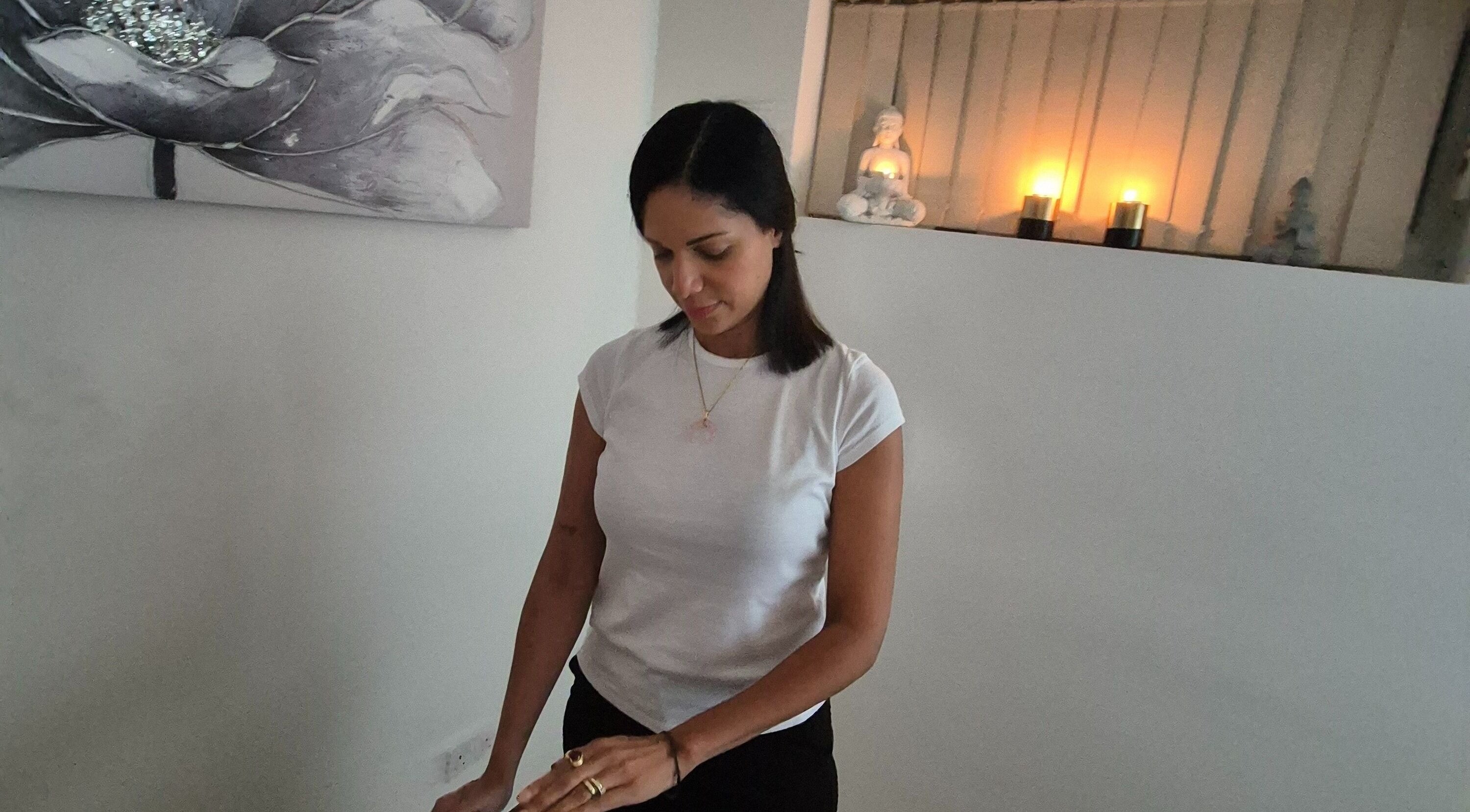 Vibeinwards therapist in peaceful setting with candles in Ruislip, England, GB.