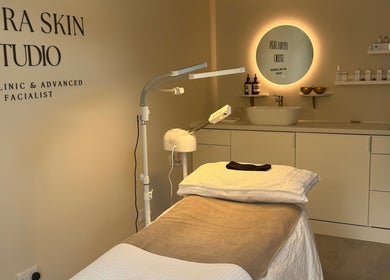 Inside HYDRASKIN STUDIO in London, England, GB, featuring a modern treatment room with spa equipment.