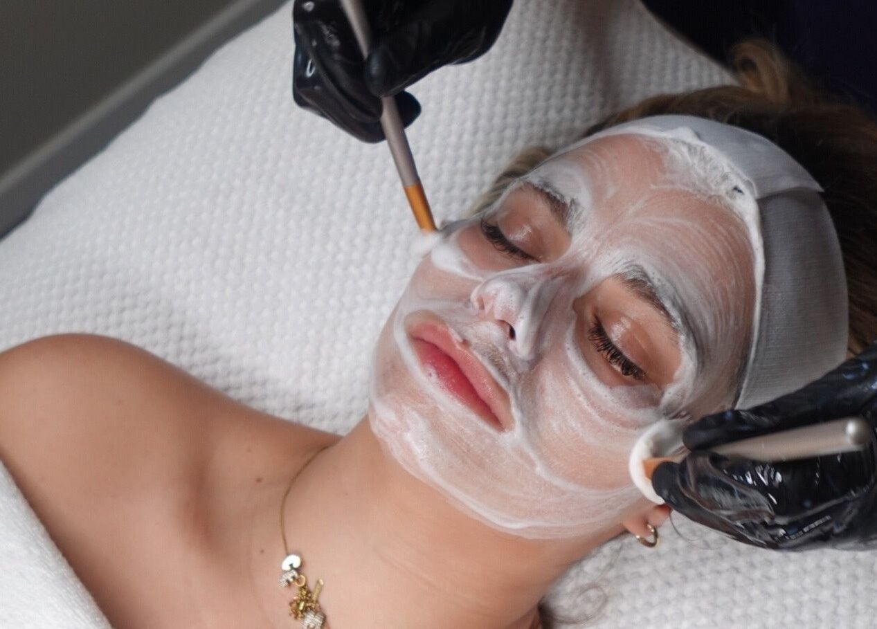 Relaxing facial treatment at HYDRASKIN STUDIO, London, England, GB with soothing cream application.