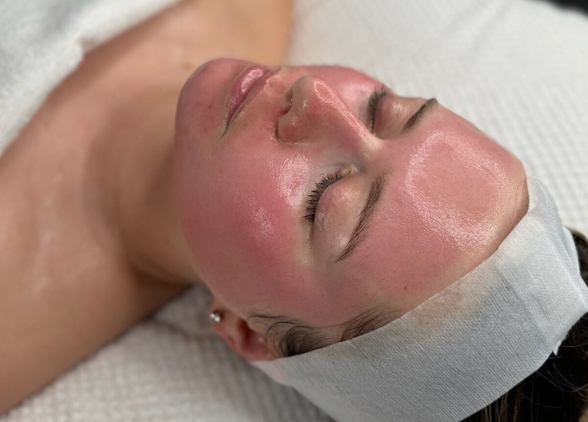 Relaxing facial treatment at HYDRASKIN STUDIO, London, England, GB, revealing smooth, radiant skin.