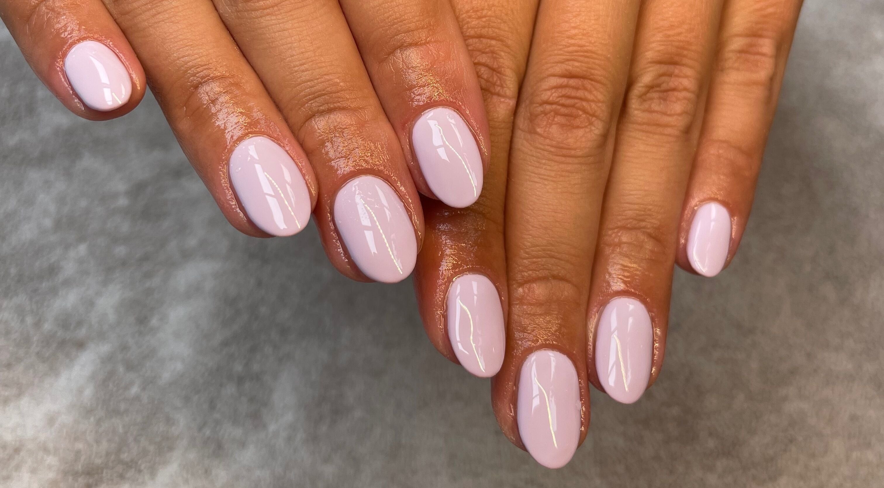 Fresh lilac manicure at Hannah - Beauty Studio, Birkenhead, England, GB. Perfect for a modern and chic look.