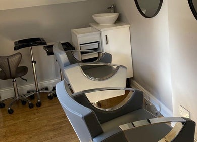 Modern styling chairs at Sarah J’s Hair Studio in Pocklington, England, GB offering chic hair treatments.