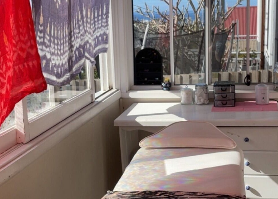 Relaxing spa room at Possession Beauty, Thirroul, New South Wales, AU with ocean view and light-filled space.
