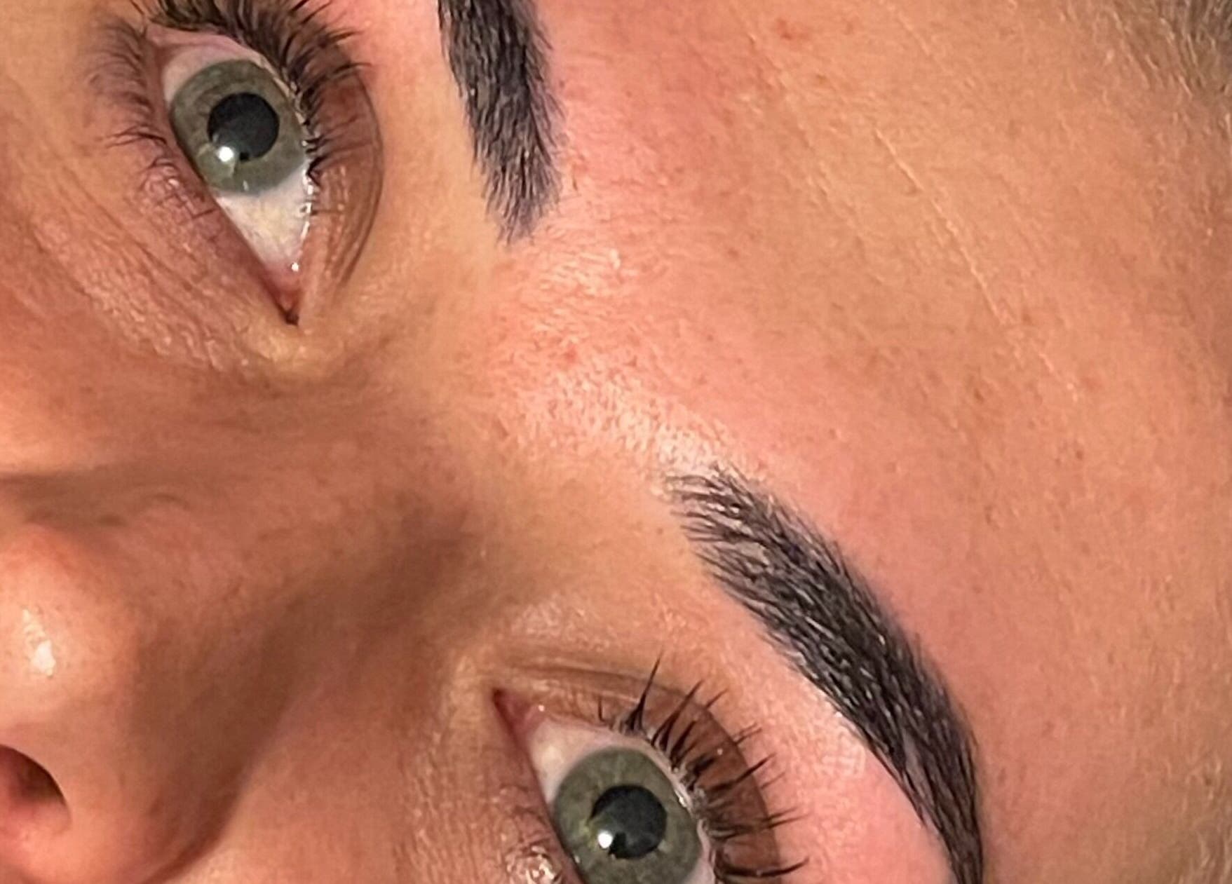 Close-up of expertly shaped eyebrows at Possession Beauty, Thirroul, New South Wales, AU.