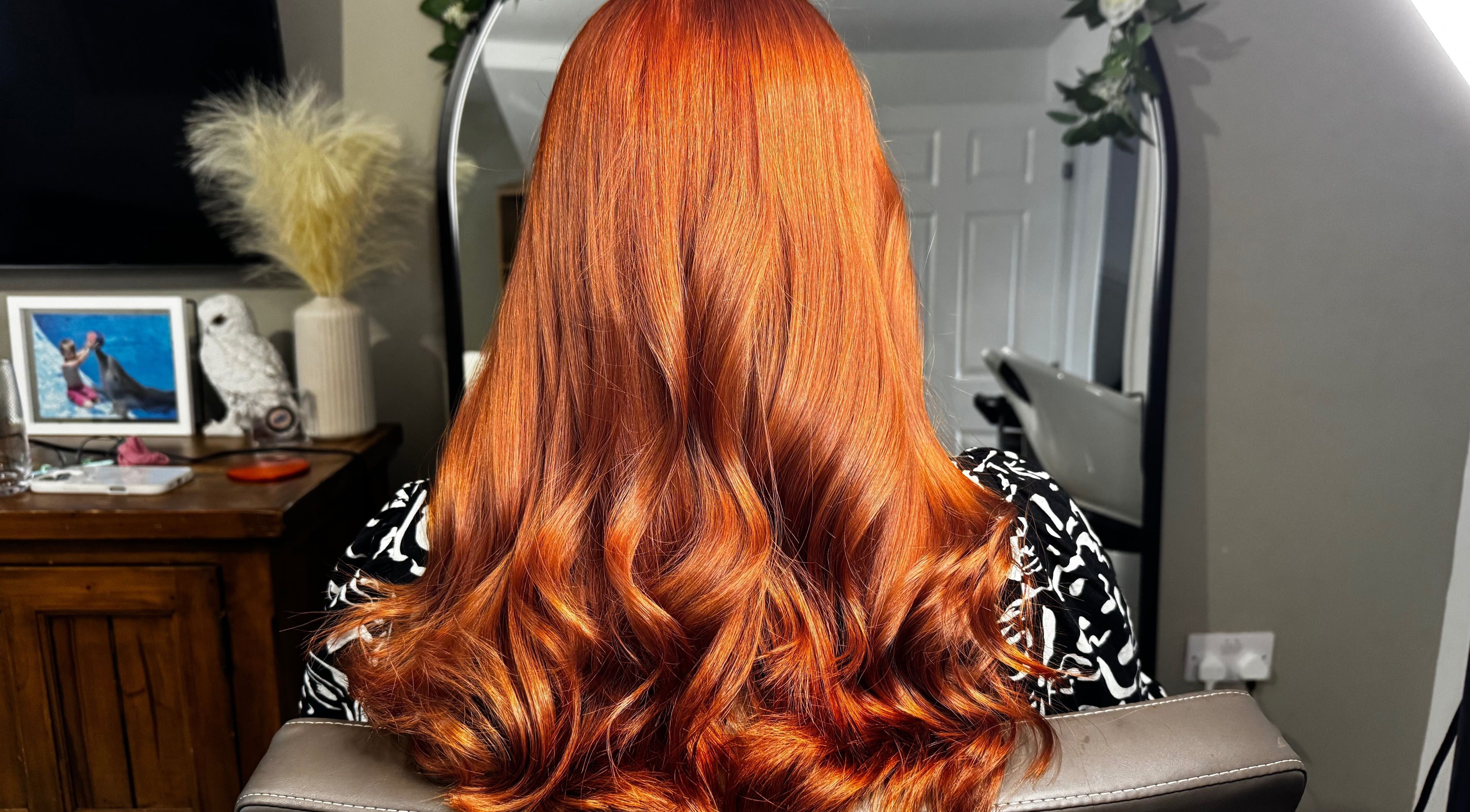 Stunning red hair at Luxe Locks, York, England, GB, showcasing vibrant salon expertise.