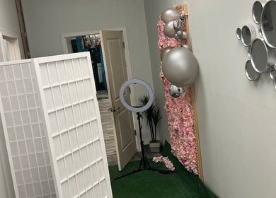 A modern corner with a mirror display at Gina African Hair Braiding, Cincinnati, Ohio, US.