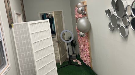 A modern corner with a mirror display at Gina African Hair Braiding, Cincinnati, Ohio, US.