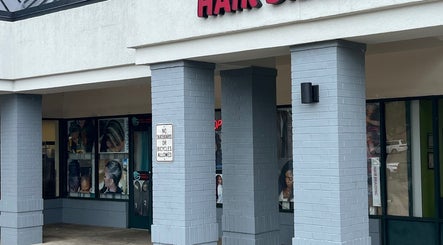 Exterior of Gina African Hair Braiding in Cincinnati, Ohio, US, showcasing the inviting salon facade.