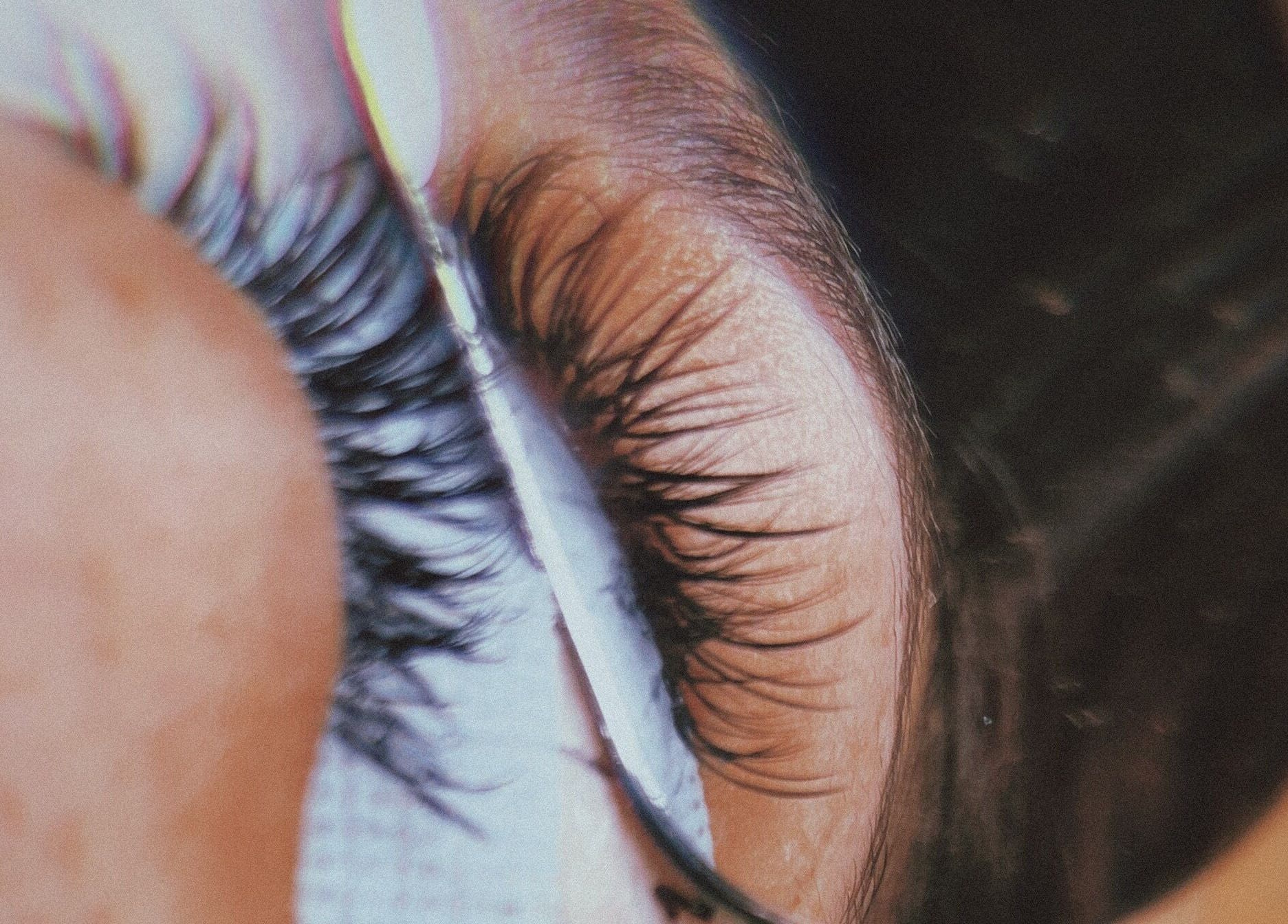 Close-up of eyelash extension at Jane Doe Beauty located in Pretoria, Gauteng, ZA, showcasing precision craftsmanship.