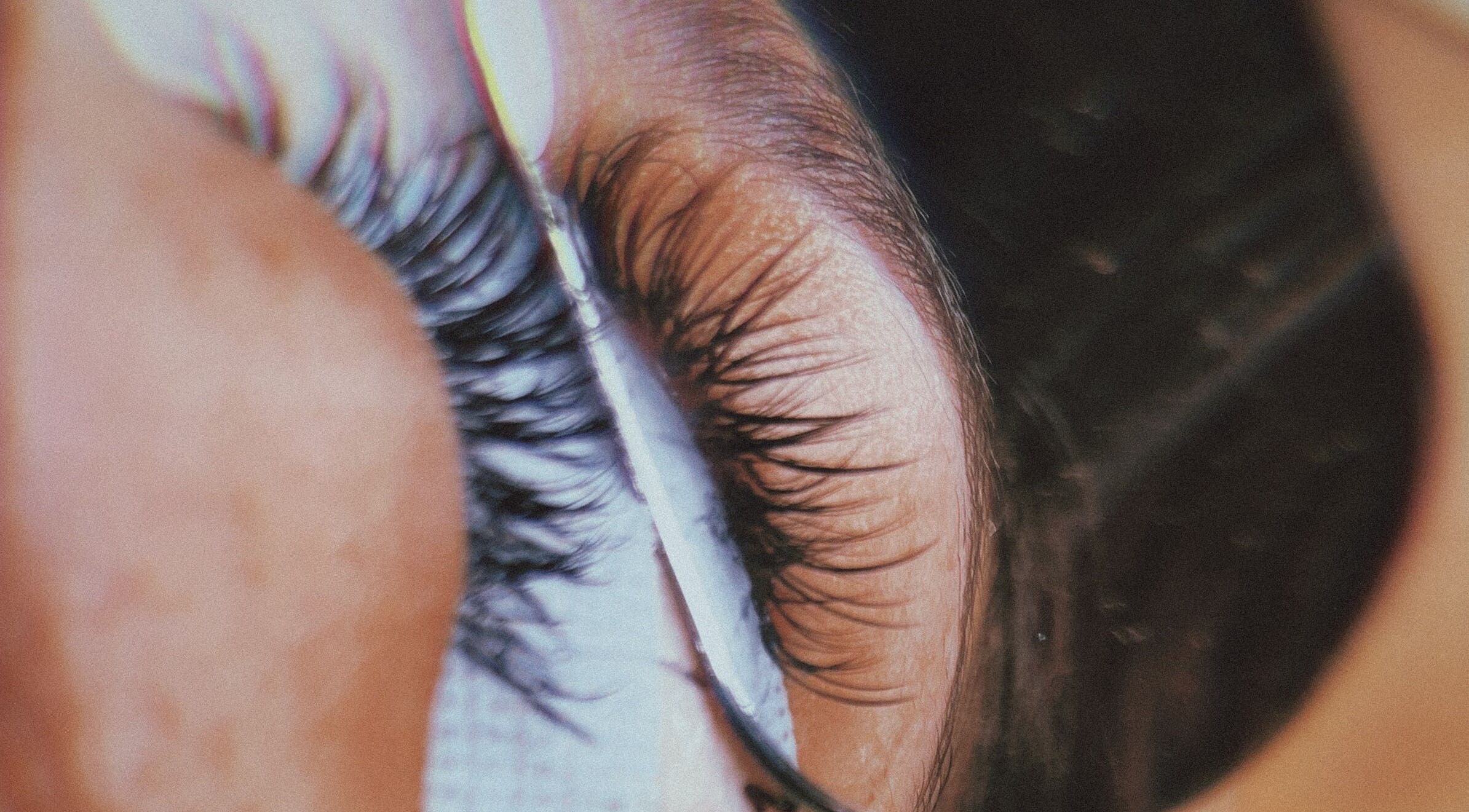 Close-up of eyelash extension at Jane Doe Beauty located in Pretoria, Gauteng, ZA, showcasing precision craftsmanship.
