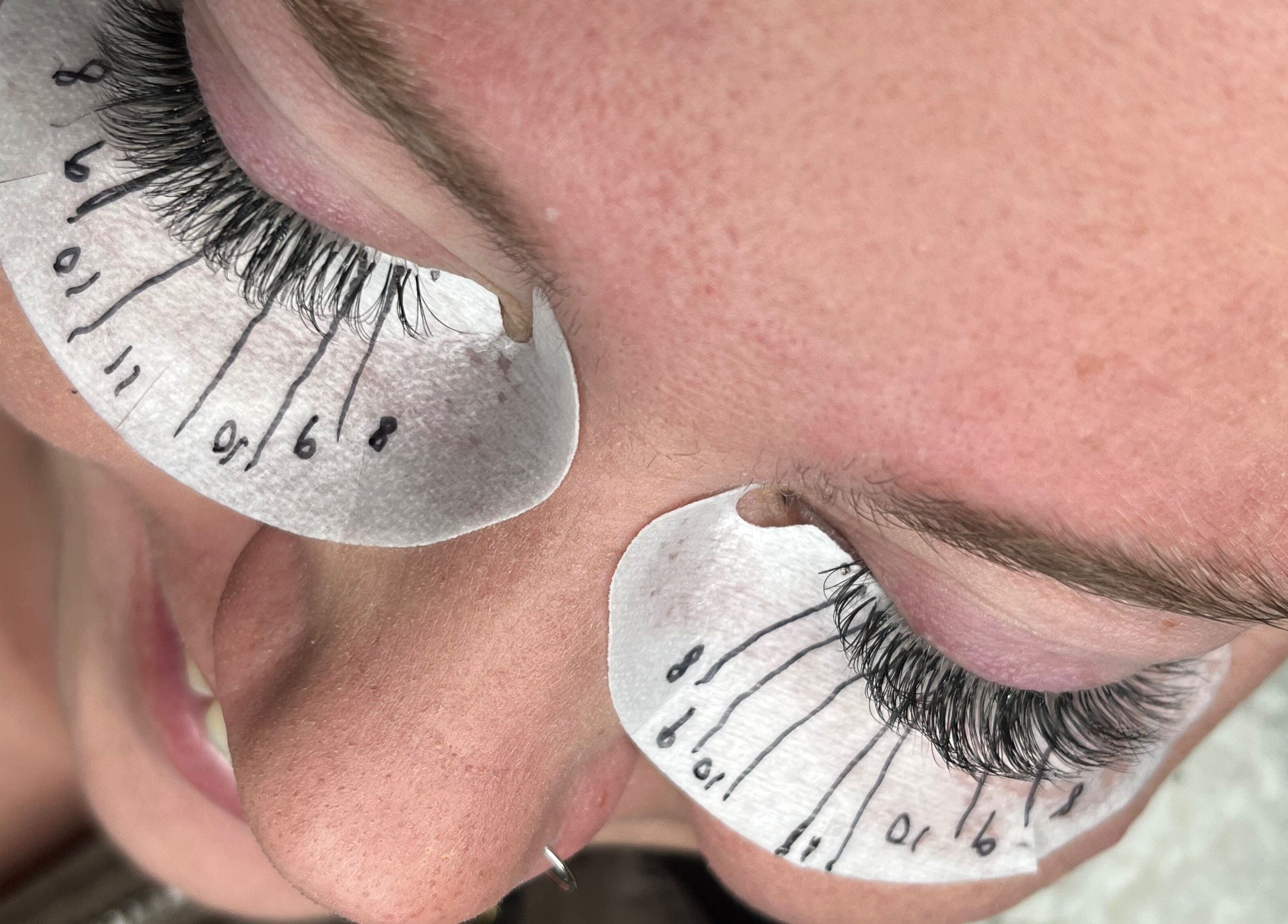 Close-up of eyelash extension application at Jane Doe Beauty, Pretoria, Gauteng, ZA.