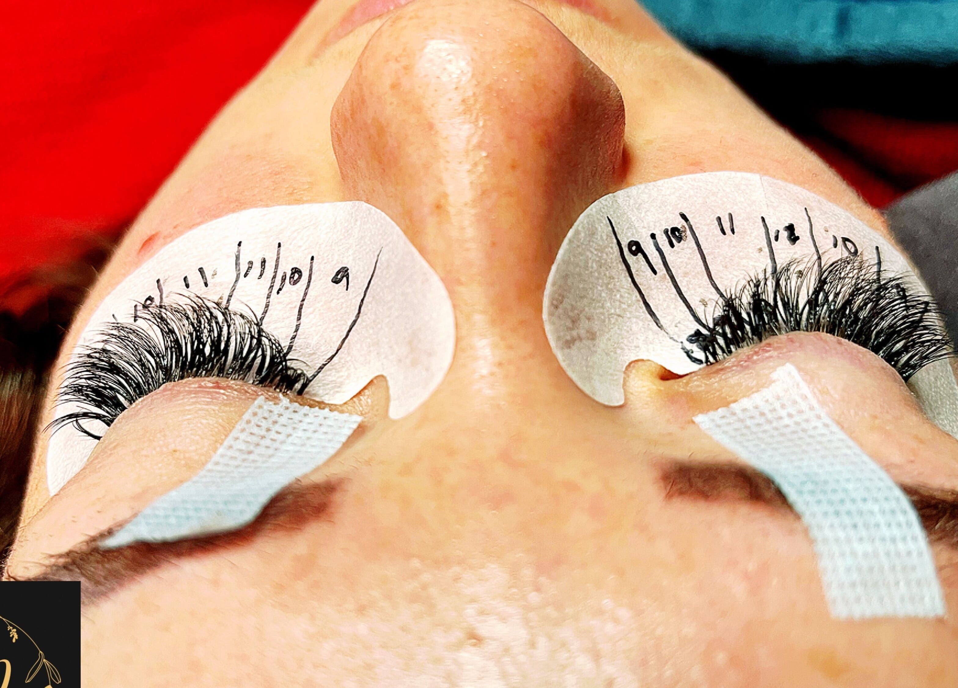Eyelash extension application process at Jane Doe Beauty, Pretoria, Gauteng, ZA.