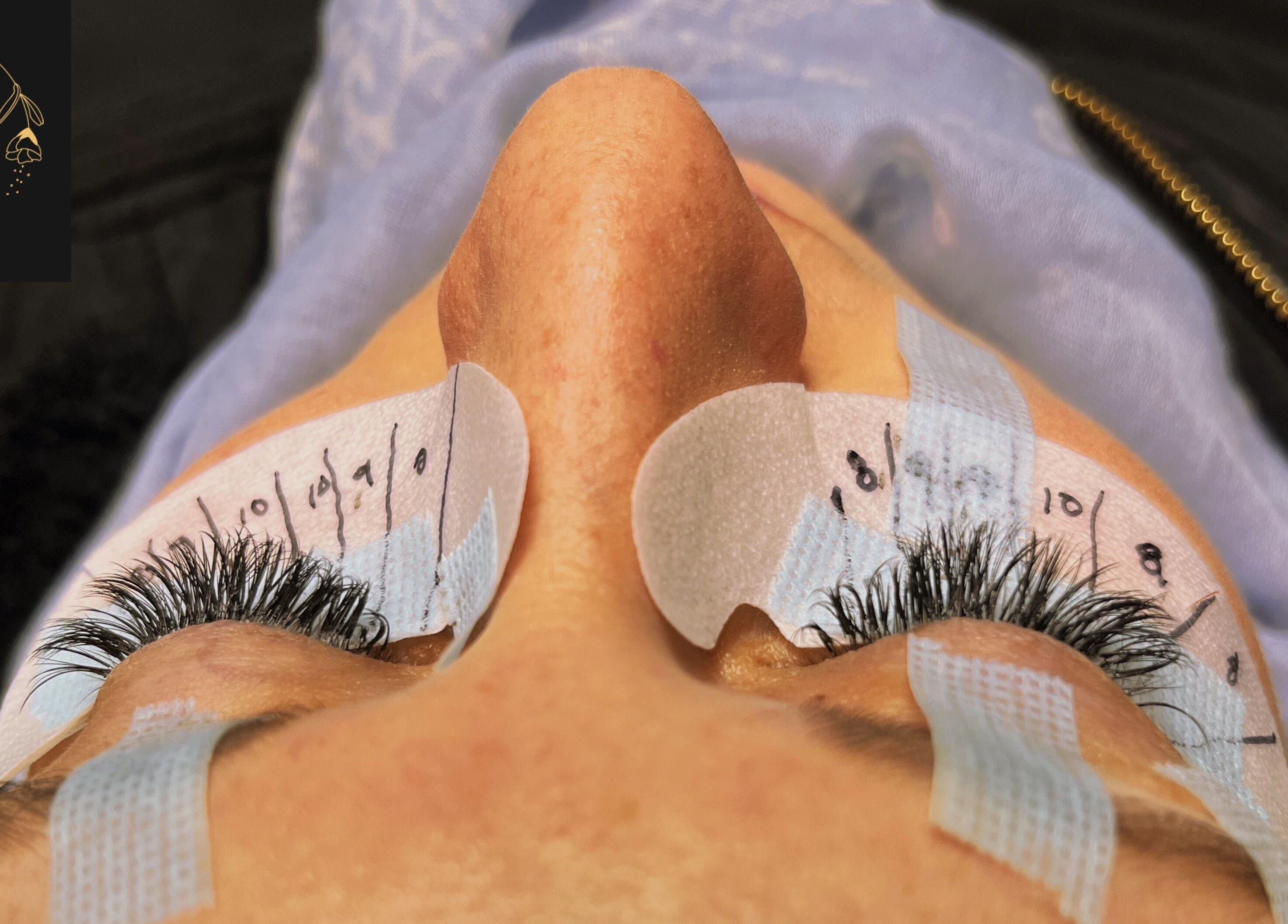 Close-up of a lash extension application at Jane Doe Beauty, Pretoria, Gauteng, ZA showcasing precision and care.