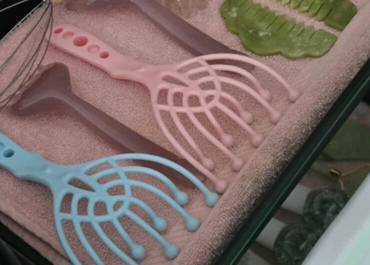 Variety of beauty tools neatly arranged at Loveli, Grangemouth, Scotland, GB for wellness treatments.