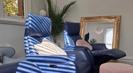 Relaxing lounge area at Little Pigeon Massage and Waxing, Melbourne, Victoria, AU with stylish décor.