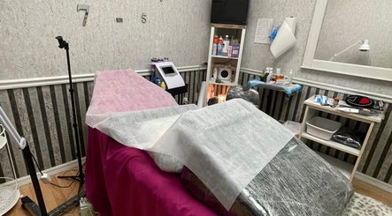 Cozy massage room at Purple Rain Lymphatic Massage, Tampa, Florida, US offering soothing treatments.