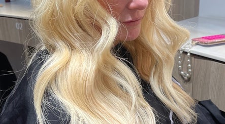 Elegant blonde waves styled at Church Hair and Extensions, West End, Queensland, AU.