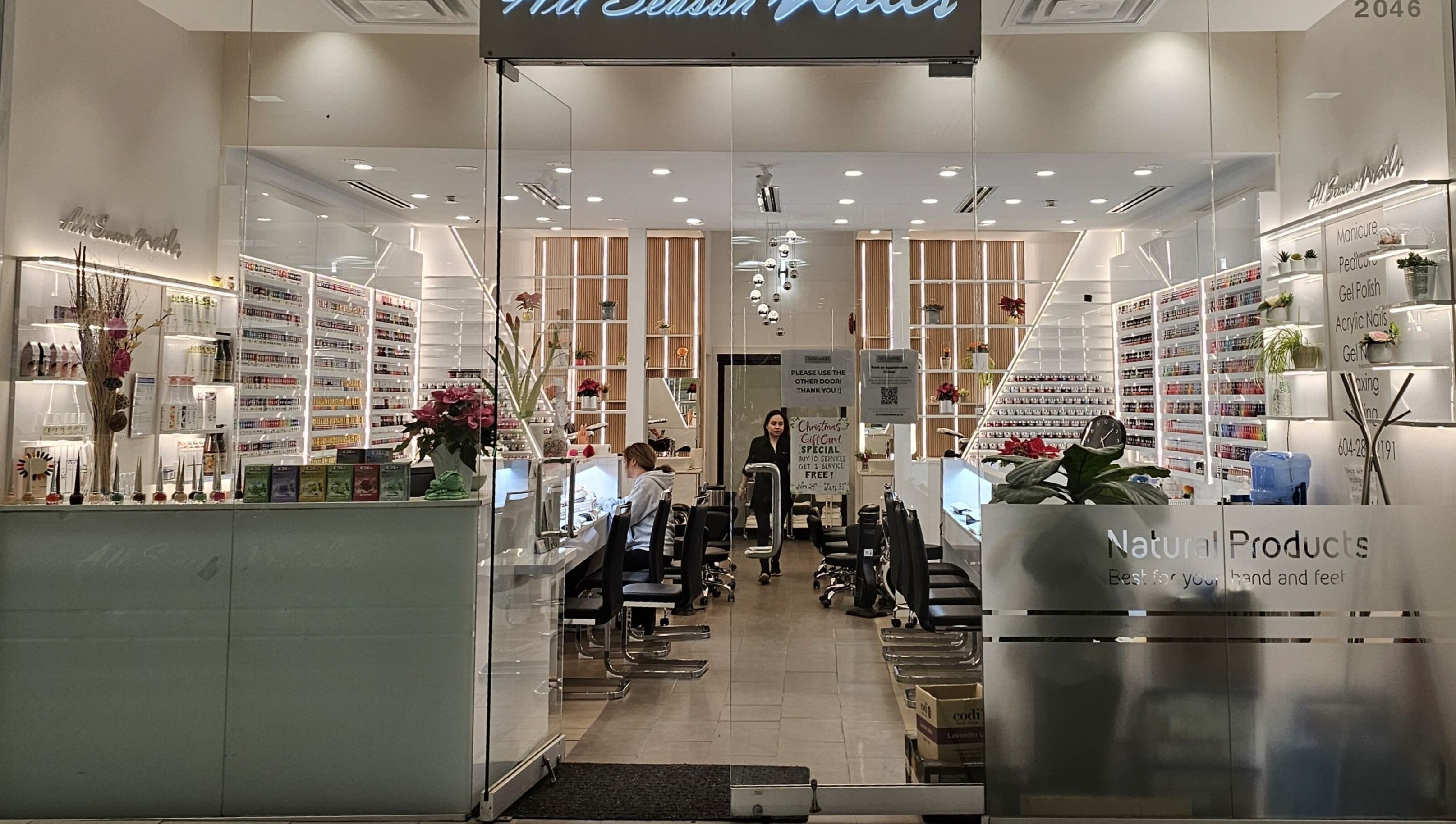 Elegant interior of All Season Nails in West Vancouver, British Columbia, CA showcasing manicure stations.