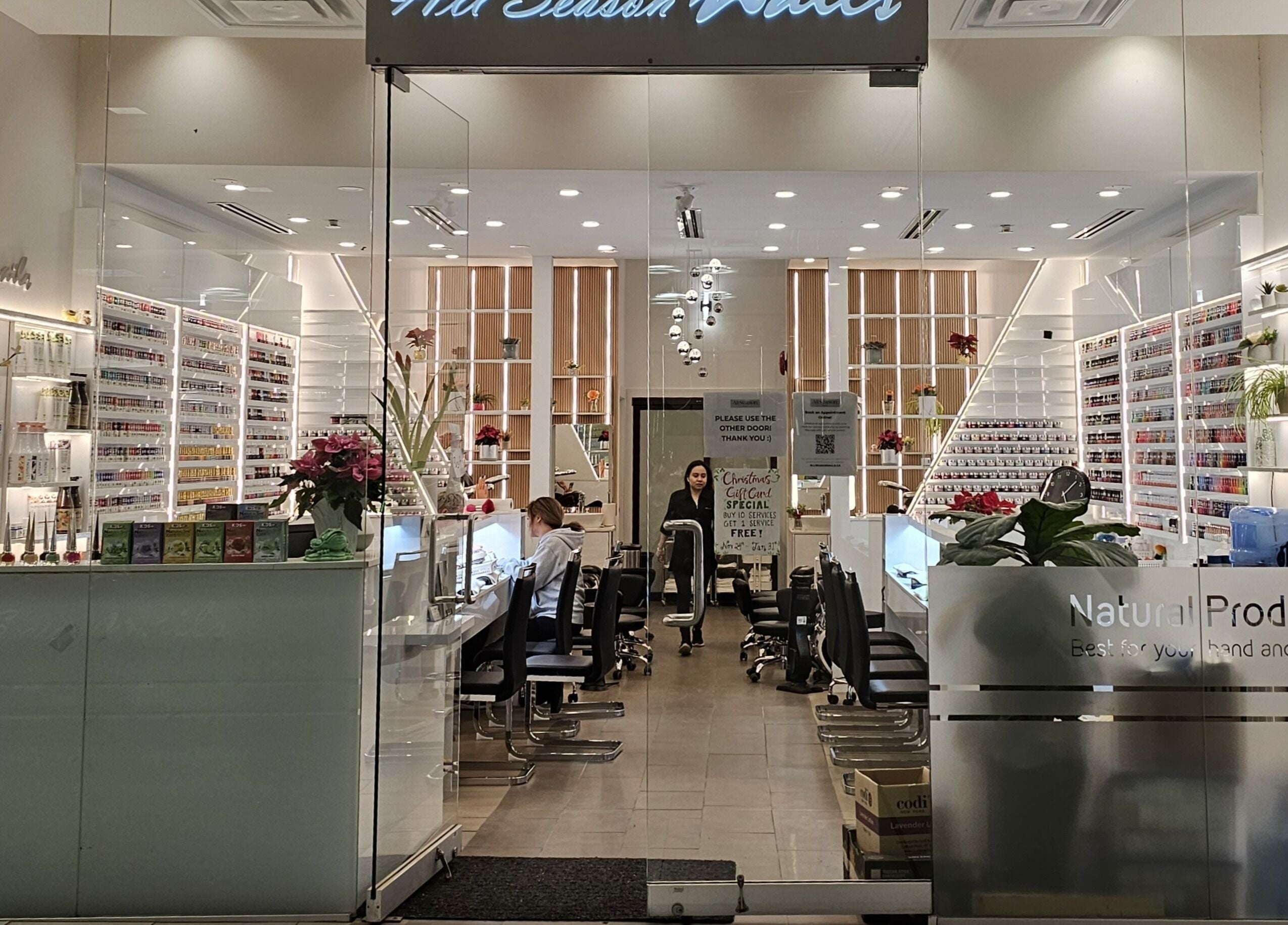 Elegant interior of All Season Nails in West Vancouver, British Columbia, CA showcasing manicure stations.