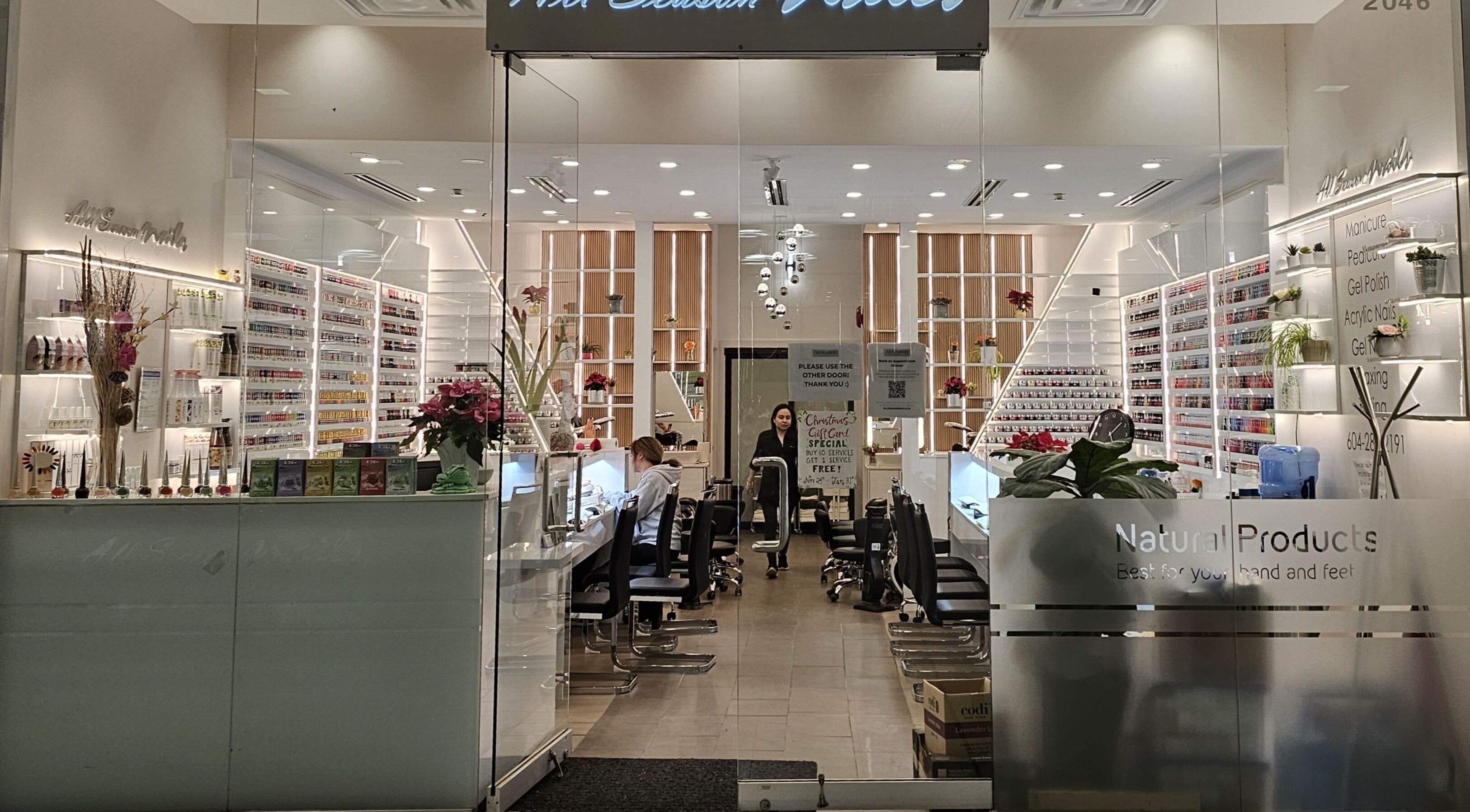 Elegant interior of All Season Nails in West Vancouver, British Columbia, CA showcasing manicure stations.