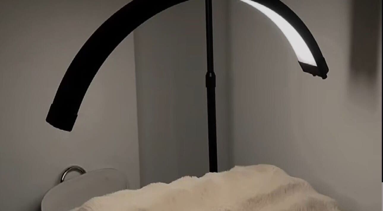 Relaxing facial room at @Luxe Looks By Maria, Allawah, New South Wales, AU with a plush treatment bed and halo lamp.