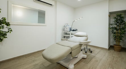 Relaxing treatment room at Lune Noire Beauty, Ir-rabat Għawdex, MT, featuring a plush reclining chair.