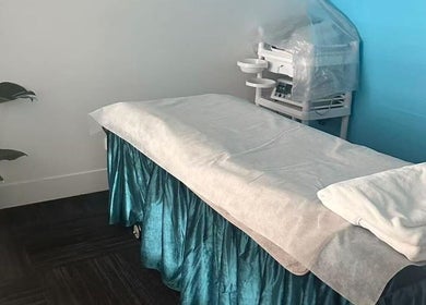 Tranquil massage room at Lucky Charm Beauty Massage in Morley, Western Australia, AU with a cozy treatment bed.