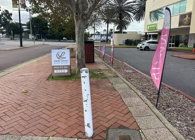 View of Lucky Charm Beauty Massage entrance on a busy street in Morley, Western Australia, AU.