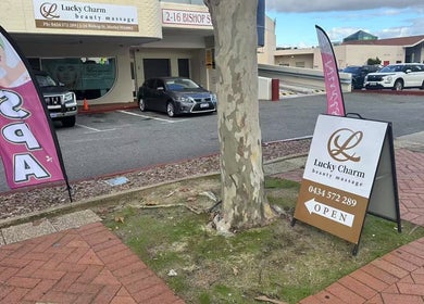 Entrance view of Lucky Charm Beauty Massage in Morley, Western Australia, showcasing signage and serene surroundings.