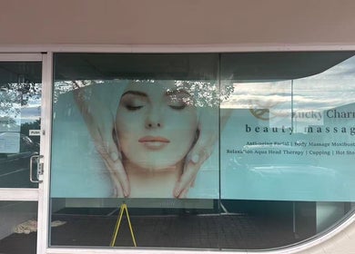 Entrance of Lucky Charm Beauty Massage in Morley, Western Australia, showcasing peaceful branding imagery.