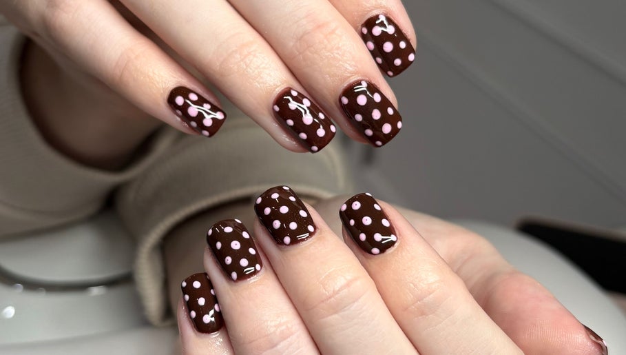 Chic brown and pink polka-dot nail art by Claudia at The Gloss Lab, Cannock, England, GB.