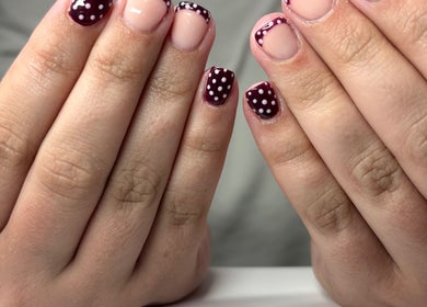 Stylish polka dot nail art by Claudia at The Gloss Lab, Cannock, England, GB.