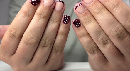 Stylish polka dot nail art by Claudia at The Gloss Lab, Cannock, England, GB.
