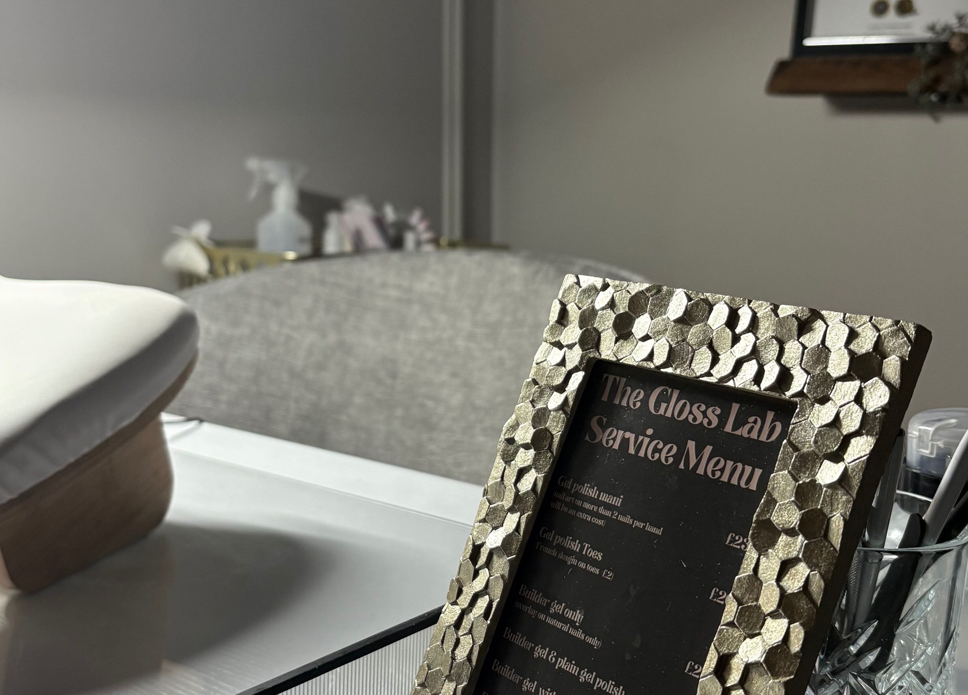 Service menu and manicure station at The Gloss Lab - nails by Claudia, Cannock, England, GB.