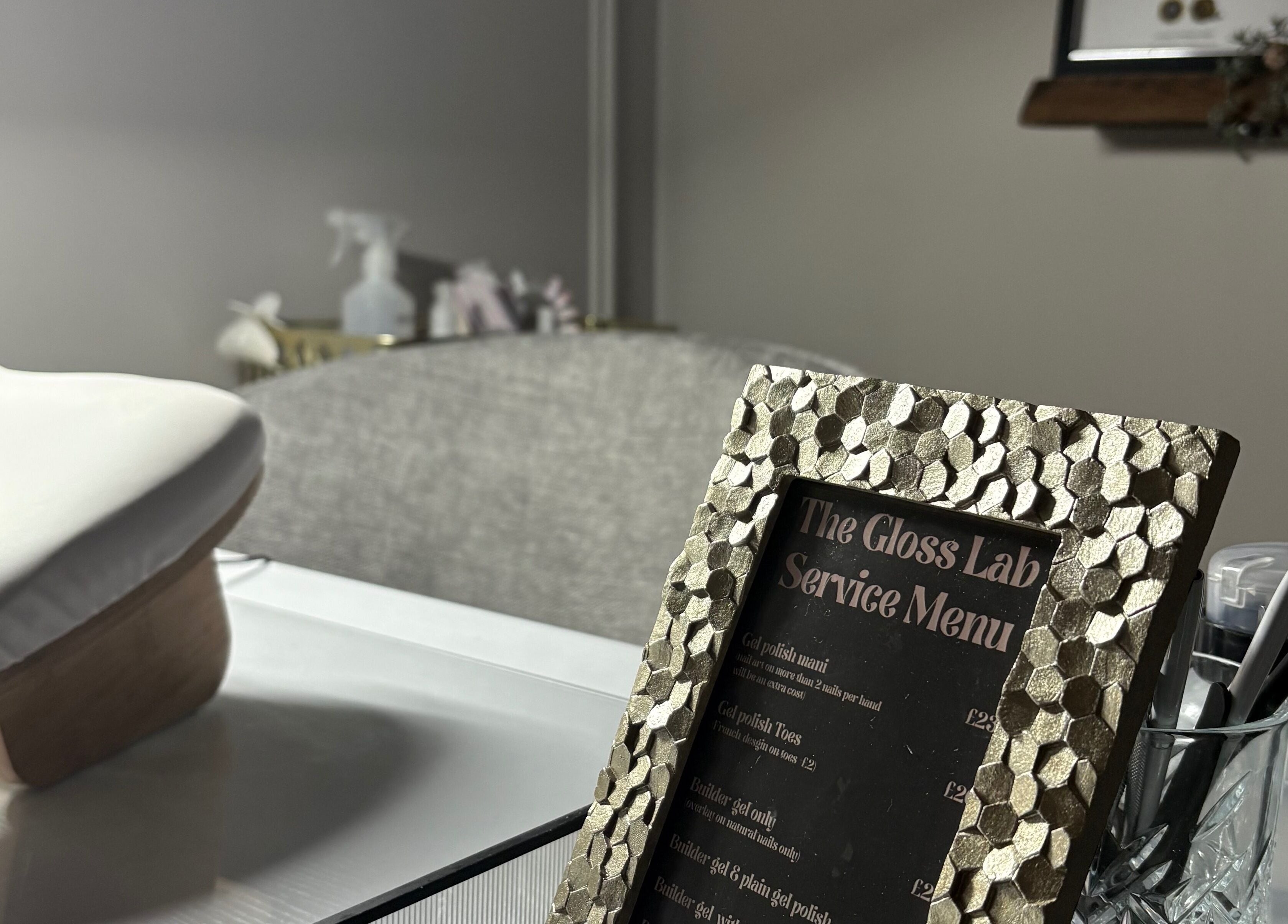 Service menu and manicure station at The Gloss Lab - nails by Claudia, Cannock, England, GB.