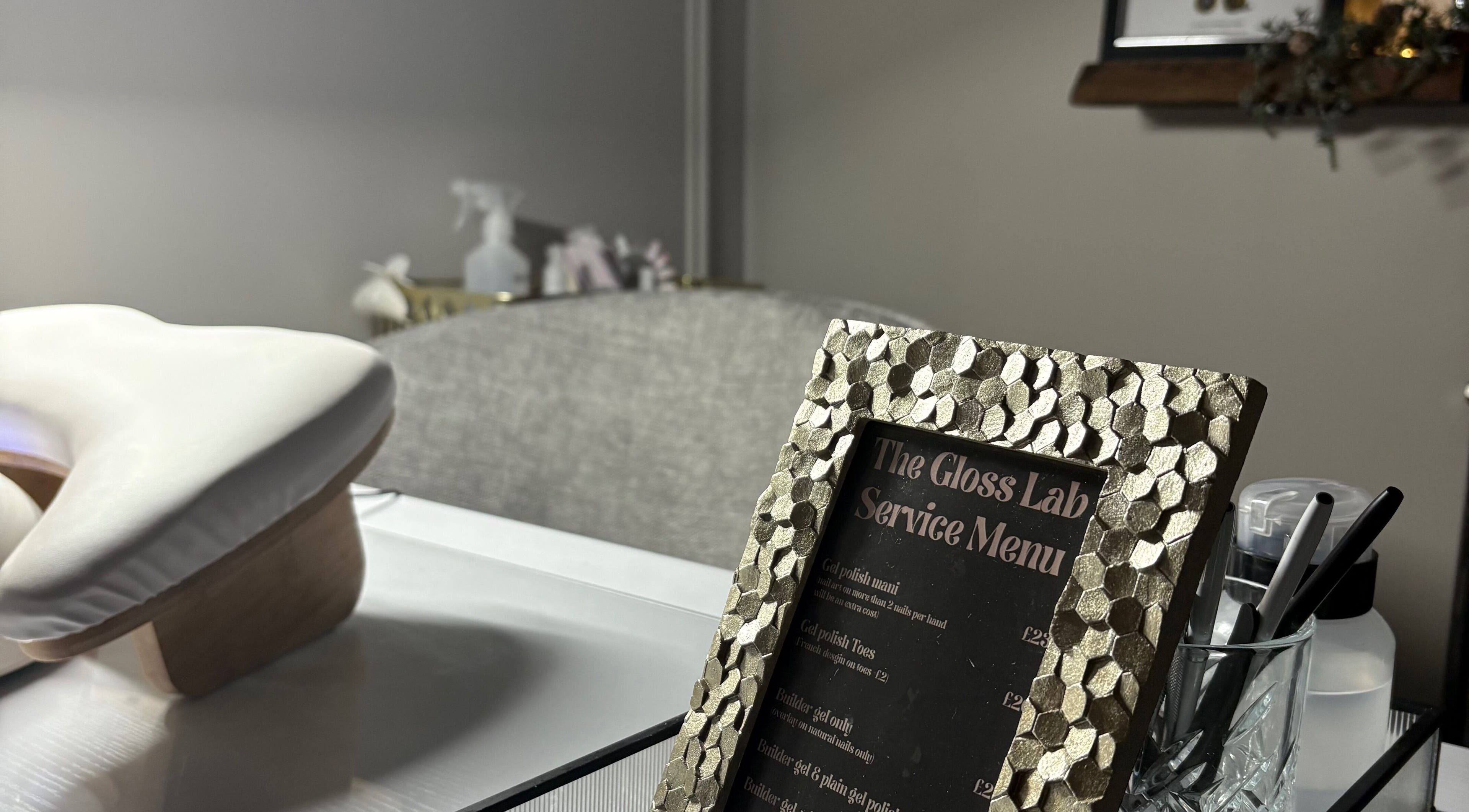 Service menu and manicure station at The Gloss Lab - nails by Claudia, Cannock, England, GB.
