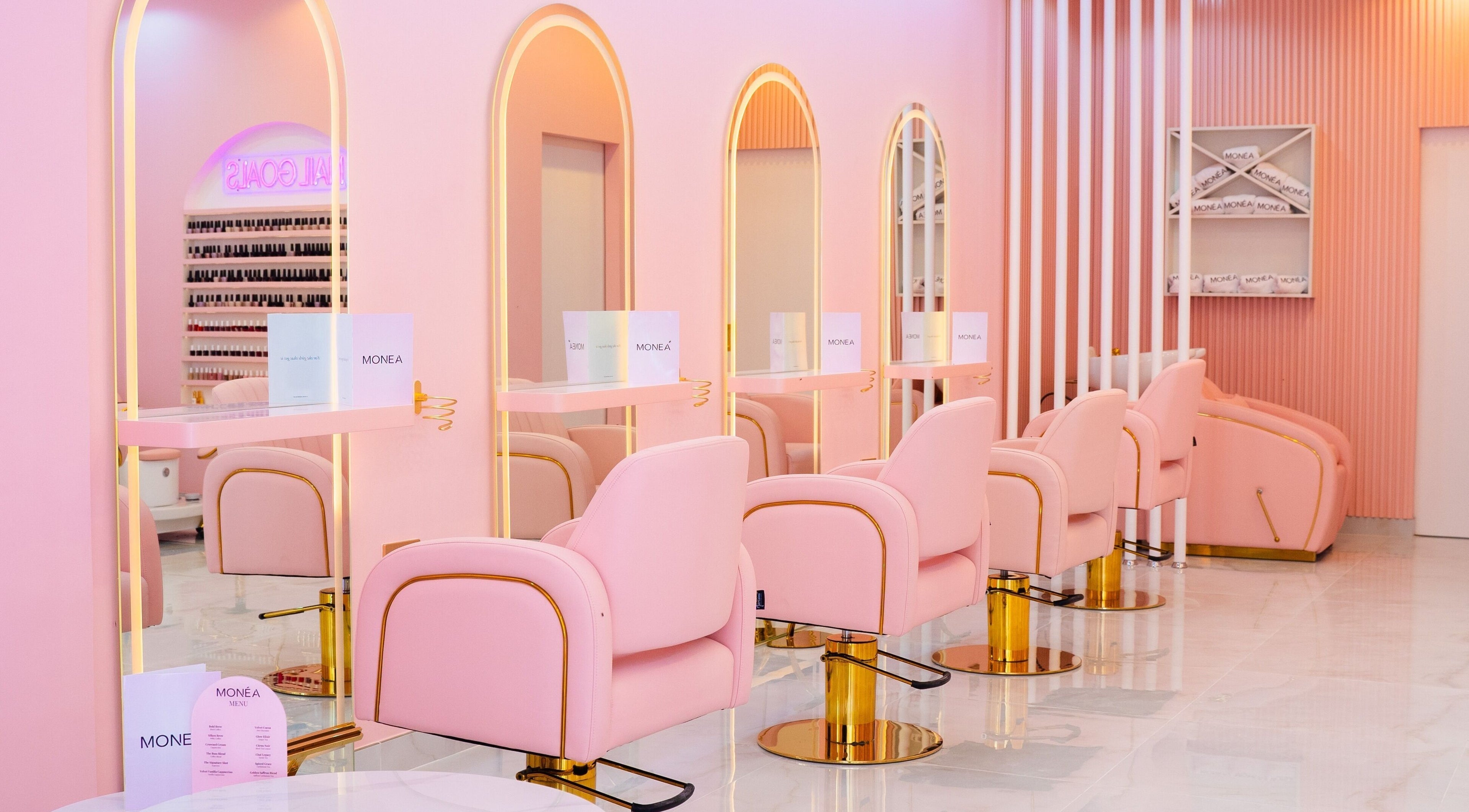 Chic pink salon chairs at Monea, Dubai, Dubai, AE offer a stylish beauty experience.