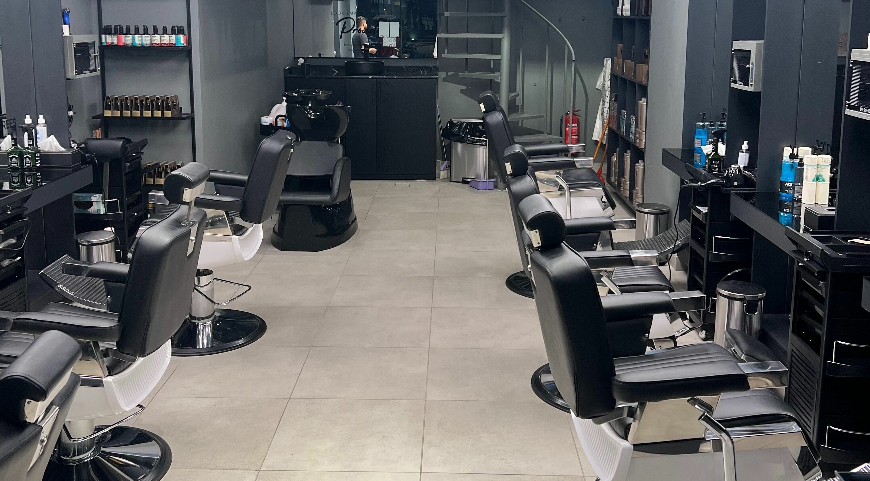 Modern barber chairs at Al Khobar 30 Degrees Barbershop | Olaya Branch, Al Khobar, Eastern Province, SA.