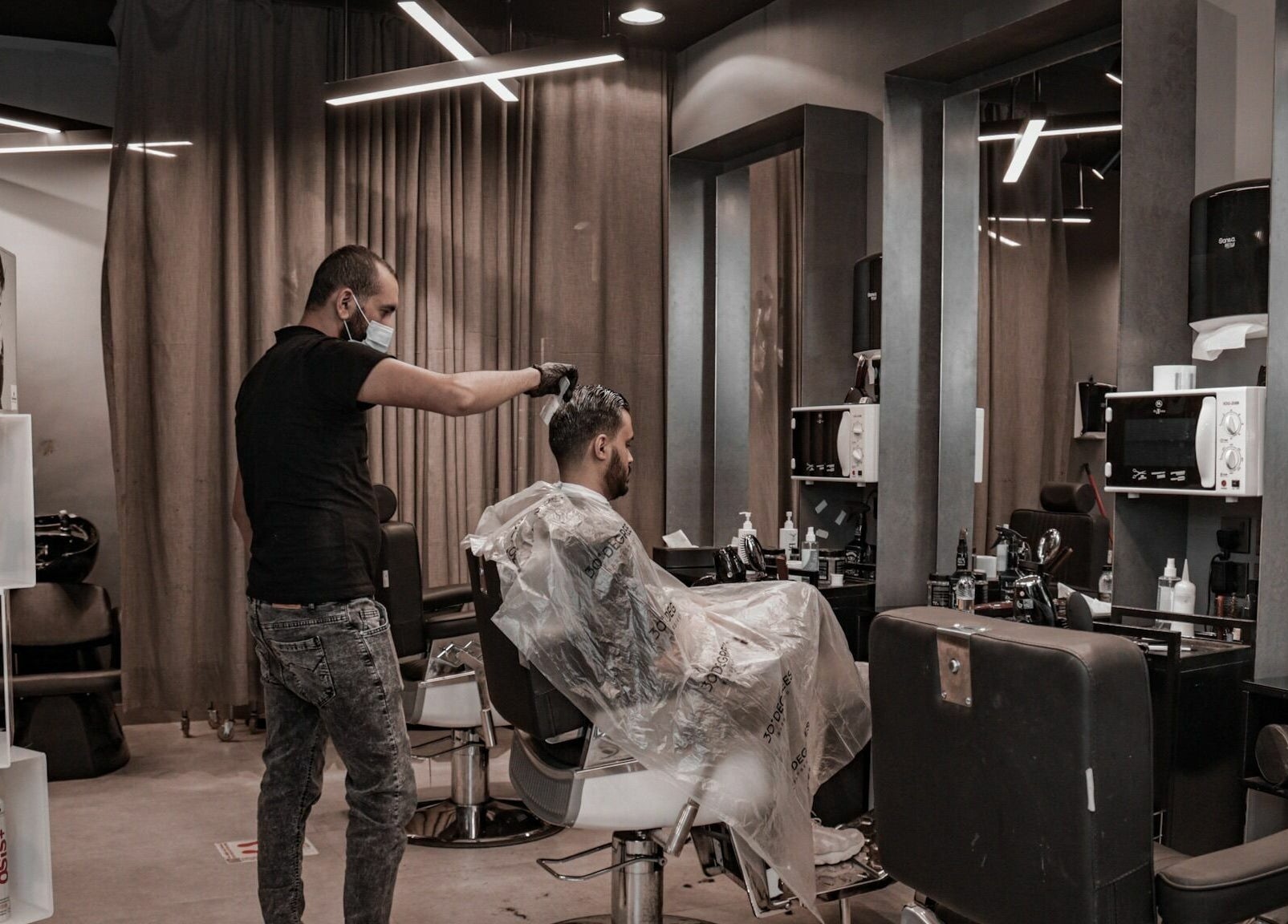 Professional hair styling at Al Mohamadyah 30 Degrees Barbershop, Riyadh, Riyadh Province, SA.