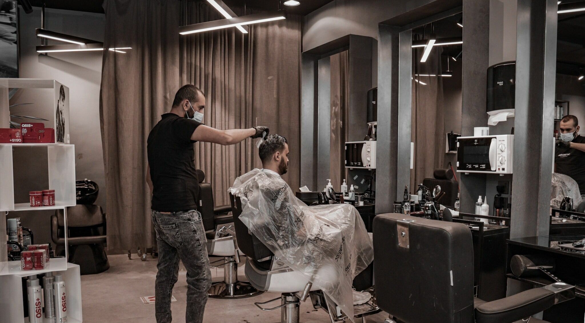 Professional hair styling at Al Mohamadyah 30 Degrees Barbershop, Riyadh, Riyadh Province, SA.