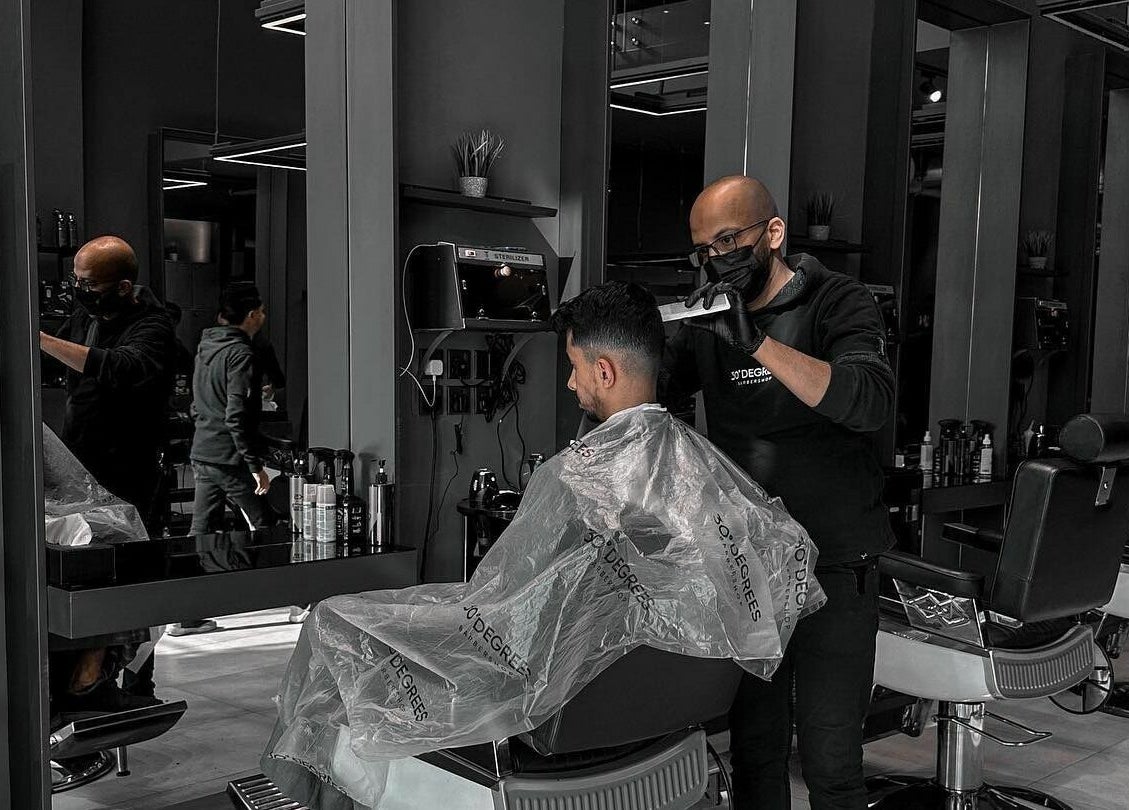 Haircut in progress at Al Mohamadyah 30 Degrees Barbershop, Riyadh, Riyadh Province, SA.