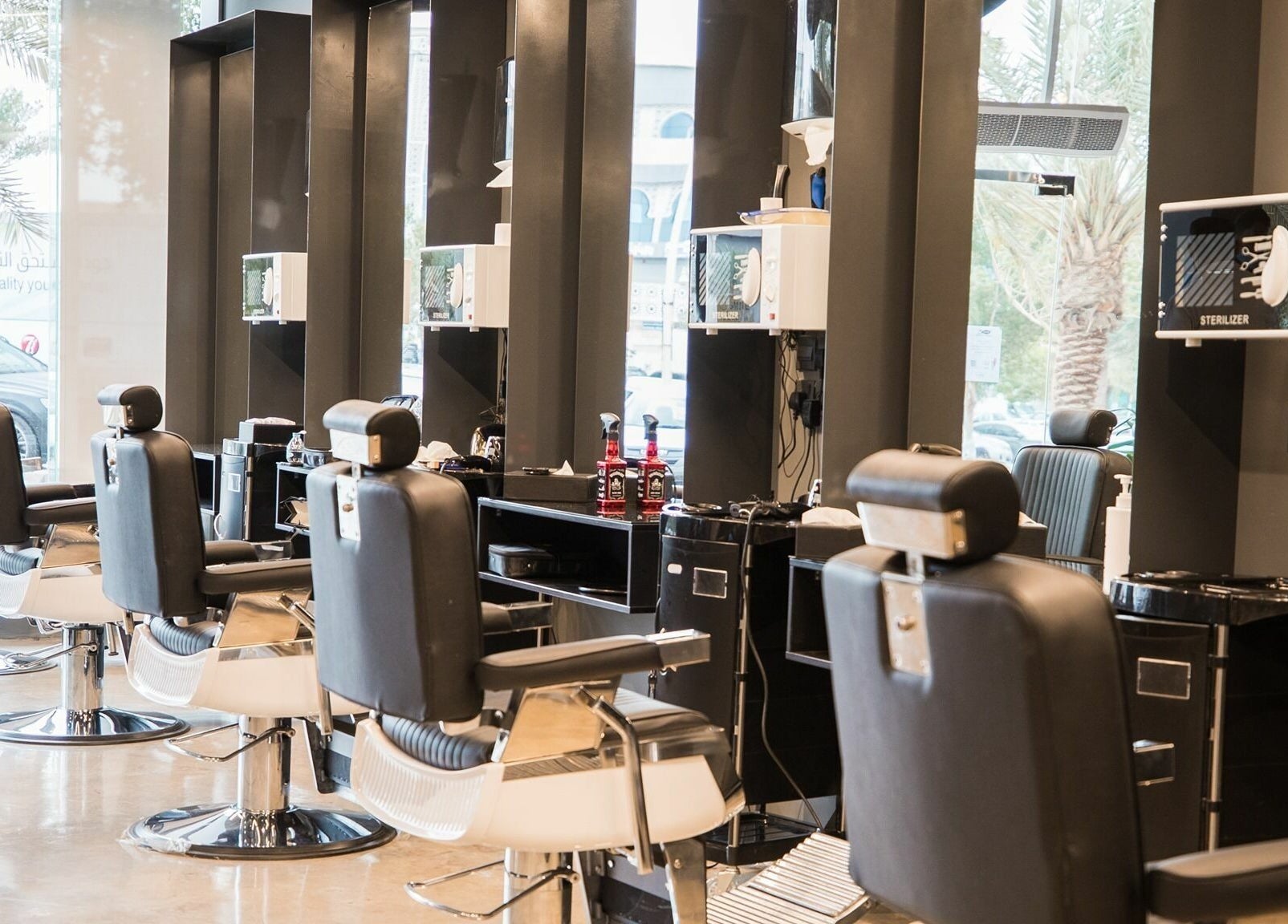 Modern barber chairs at AlUla 30 Degrees Barbershop in AlUla, Eastern Province, SA.