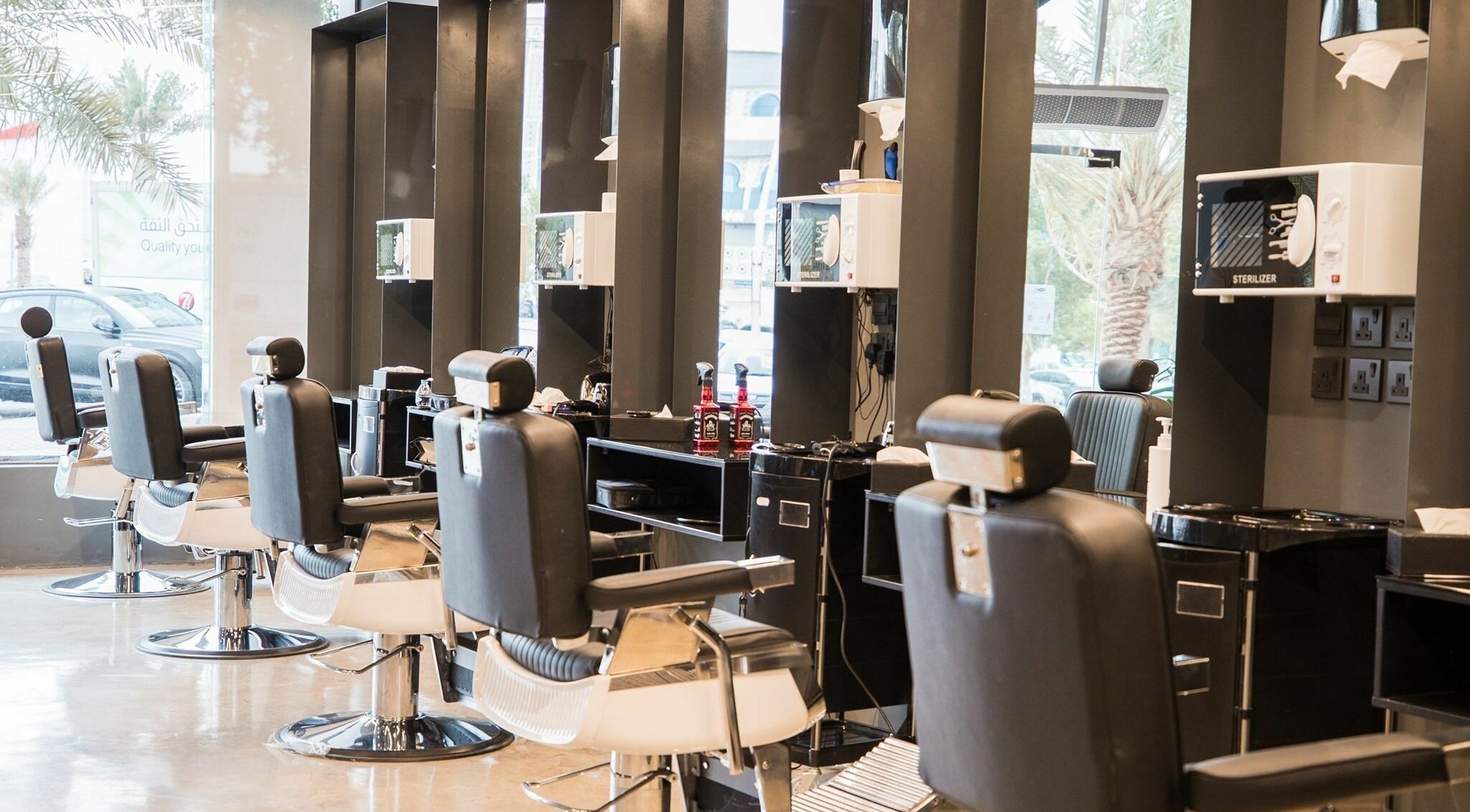 Modern barber chairs at AlUla 30 Degrees Barbershop in AlUla, Eastern Province, SA.