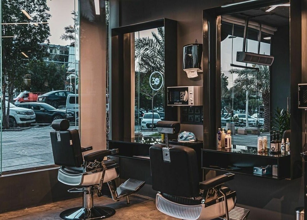 Modern barber chair at Almahdiyah 30 Degrees Barbershop in Riyadh, Riyadh Province, SA.