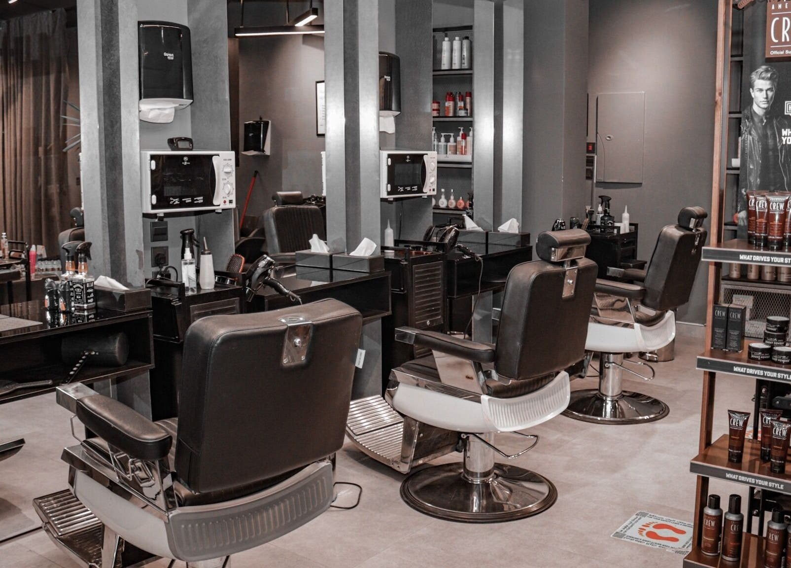 Stylish interior of Al Nakheel 30 Degrees Barbershop in Riyadh, Riyadh Province, SA, showcasing modern barber chairs.