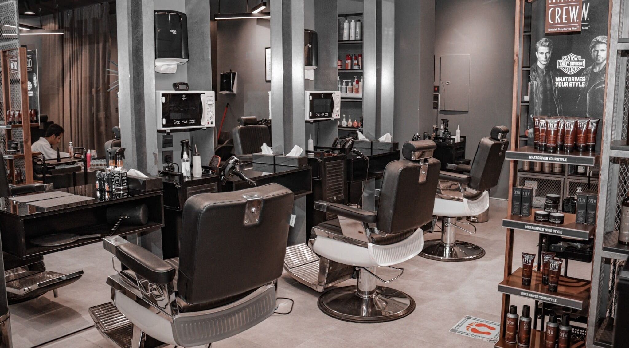 Stylish interior of Al Nakheel 30 Degrees Barbershop in Riyadh, Riyadh Province, SA, showcasing modern barber chairs.