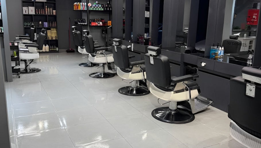 Interior of Jeddah 30 Degrees Barbershop Alnaeem, stylish barber chairs in Jeddah, Makkah Province, SA.