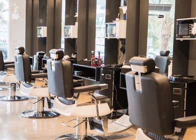 Modern barber chairs at 30 Degrees Barbershop, Makkah, Makkah Province, SA, offering a stylish grooming experience.