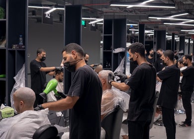 Stylists at work in 30 Degrees Barbershop, Makkah, Makkah Province, SA, providing haircuts and grooming services.